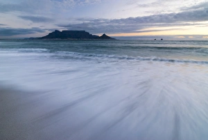 Table Mountain, Lions Head and Devils Peak in the evening light, panoramic views of Cape Town, Bloubergstrand beach, Table Bay, Atlantic Ocean, Cape Town, Western Cape, South Africa Table Mountain, Lions Head and Devils Peak in the evening light, panoramic views of Cape Town, Bloubergstrand beach, Table Bay, Atlantic Ocean, Cape Town, Western Cape, South Africa