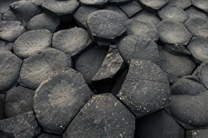 The texture of basalt column at Giants Causeway, Northern Ireland The texture of basalt column at Giants Causeway, Northern Ireland