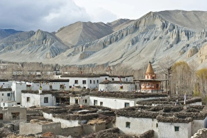 Tibetan architecture, houses with flat roofs, erosion in the mountains Tibetan architecture, houses with flat roofs, erosion in the mountains