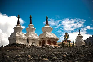 Tibetan white pagodas with Thiksey Monastery Tibetan white pagodas with Thiksey Monastery