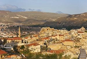 Townscape, Urgup, Mount Erciyes volcano at the back, Nevsehir Province, Cappadocia Townscape, Urgup, Mount Erciyes volcano at the back, Nevsehir Province, Cappadocia