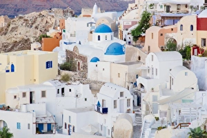 Traditional Greek white houses in Oia village, Santorini, Cyclades, Greece Traditional Greek white houses in Oia village, Santorini, Cyclades, Greece