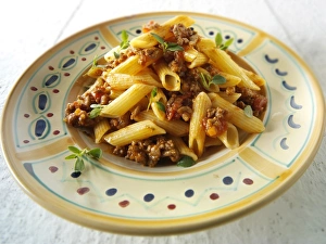 Traditional Penne pasta with bolognese sauce Traditional Penne pasta with bolognese sauce