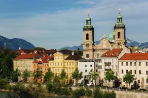 Prints of Cityscape of Innsbruck with Cathedral of St. James on the right, houses at the Inn river bank and Alps mountains on the background. Innsbruck, Austria Austria Prints: Innsbruck Print: Cathedral of St. James and Alps Mountains