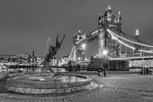 Prints of A monochrome view of Tower Bridge, London with the dolphin statue seen to the left. Night-time shot World Famous Bridges Prints: Monochrome Tower Bridge Print: Nighttime London Scene