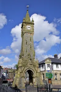 Prints of The clock is a landmark in the centre of Machynlleth Travel Imagery Prints: Machynlleth Town Clock Print: A 19th-Century Landmark