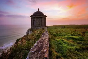 Prints of Mussenden Temple is a small circular building located on cliffs near Castlerock in County Londonderry, high above the Atlantic Ocean on the north-western coast of Northern Ireland County Londonderry Prints: Mussenden Temple Print, Castlerock Coastline
