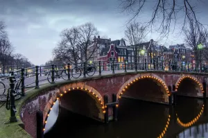 Prints of This cityscape of Amsterdams Prinsengracht Canal during the blue hour is recognized by UNESCO as a World Heritage Site Netherlands Prints: Prinsengracht Canal Blue Hour Print (UNESCO World Heritage)