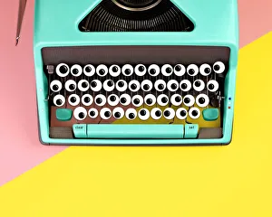 Typewriter with googly eyes for keys