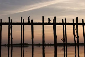 U Bein Bridge in the evening light, near Mandalay, Myanmar U Bein Bridge in the evening light, near Mandalay, Myanmar
