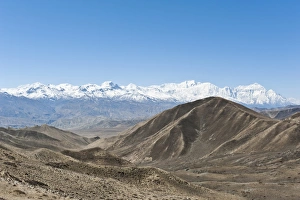 Vast landscape with the snow-covered mountains of the Annapurna Range at back Vast landscape with the snow-covered mountains of the Annapurna Range at back