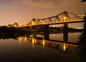 Vietnam - Reflections of Long Bien bridge on Song Hong river, Hanoi Vietnam - Reflections of Long Bien bridge on Song Hong river, Hanoi