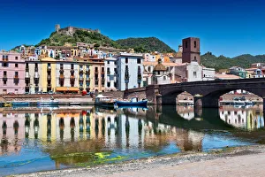 View over the colourful town of Bosa and its medieval castle along the Temo river View over the colourful town of Bosa and its medieval castle along the Temo river