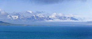 View across the Eyjafoerdur to the snow-capped mountains near Dalvik, Akureyri, Iceland View across the Eyjafoerdur to the snow-capped mountains near Dalvik, Akureyri, Iceland
