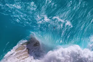 Top view of huge ocean waves at Kelingking Beach, Nusa Penida Island, Indonesia Top view of huge ocean waves at Kelingking Beach, Nusa Penida Island, Indonesia