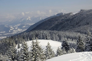 View from the peak of Mt Schwarzenberg to a snow-covered alpine upland View from the peak of Mt Schwarzenberg to a snow-covered alpine upland