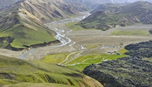 View from Suournamur Mountain over the Laugahraun lava field with cabins and a camping site, Landmannalaugar View from Suournamur Mountain over the Laugahraun lava field with cabins and a camping site, Landmannalaugar