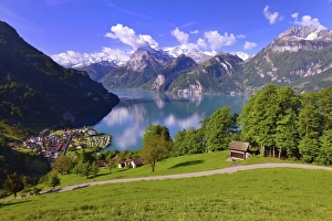 Views of Sisikon and Urnersee lake, part of Lake Lucerne, Swiss Path, Uri Alps or Urner Alps in Central Switzerland Views of Sisikon and Urnersee lake, part of Lake Lucerne, Swiss Path, Uri Alps or Urner Alps in Central Switzerland