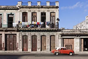 Vintage car driving on Havana street, Havana, Cuba Vintage car driving on Havana street, Havana, Cuba