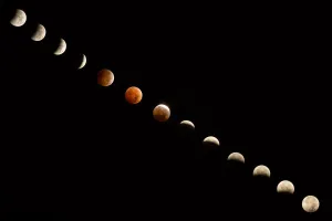 Lunar Eclipse Photography Prints: Composite of Total Lunar Eclipse in a dark sky