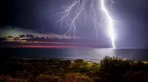 Prints of Lightning strikes over the ocean at sunset Lightning Storm Prints: Lightning Storm Print: Sunset Ocean Strike