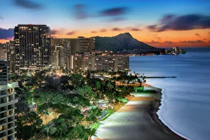 Travel imagery/travel destinations waikiki hawaii/waikiki sunrise high rise hotels line shore Travel imagery/travel destinations waikiki hawaii/waikiki sunrise high rise hotels line shore
