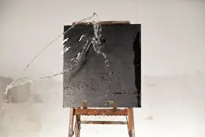 Digital Composite Art Prints: Water being splashed on a blackboard