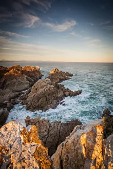 Wide angle landscape image of rock formations and the indian ocean along the Garden Route Wide angle landscape image of rock formations and the indian ocean along the Garden Route