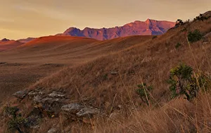 Wide Angle View of a Dramatic Sunrise over the Valley of Giants Castle in the Drakensberg Mountains of South Africa Wide Angle View of a Dramatic Sunrise over the Valley of Giants Castle in the Drakensberg Mountains of South Africa