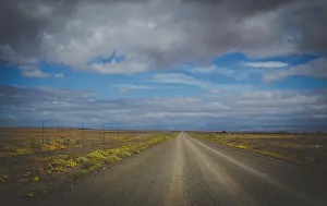 Wide angle view over the gravel road between Ceres and Calvinia through the Tankwa karoo Wide angle view over the gravel road between Ceres and Calvinia through the Tankwa karoo