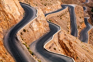 Winding road with hairpin bends up the rocky Atlas mountains from the Dades Valley Winding road with hairpin bends up the rocky Atlas mountains from the Dades Valley