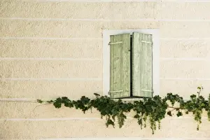 Provence Travel Images Prints: Window almost closed shutters, facade