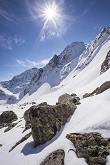 Winter landscape with sun toward the Steintalspitze summit, Stubai Alps, Kuhtai, Tyrol Winter landscape with sun toward the Steintalspitze summit, Stubai Alps, Kuhtai, Tyrol