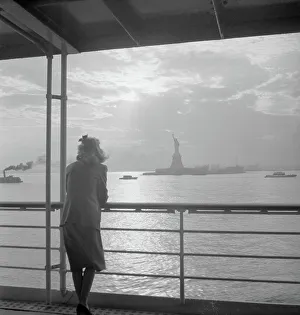 Woman Looking at Statue of Liberty Print