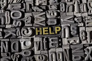 Old Lead Type Print of the Word Help