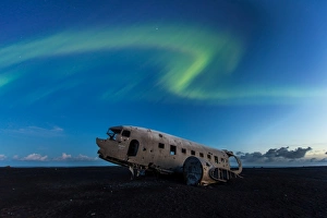 The wrecked plane and northern lights, Iceland The wrecked plane and northern lights, Iceland