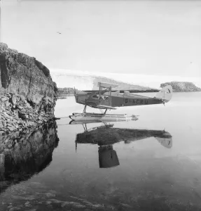 Print of a De Havilland Moth biplane on floats in Stella Creek