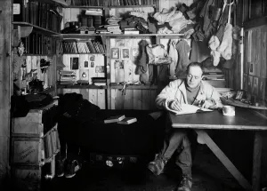 Capt Scott writing his journal in the Winterquarters Hut. October 7th 1911 Capt Scott writing his journal in the Winterquarters Hut. October 7th 1911