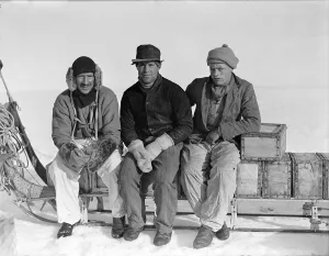 Lindsay, Scott and Stephenson, sitting on sledge, Ivigtut journey Lindsay, Scott and Stephenson, sitting on sledge, Ivigtut journey