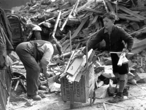 11 year old Lambeth boy sells firewood from bombed houses for Londons War Weapon Week 11 year old Lambeth boy sells firewood from bombed houses for Londons War Weapon Week