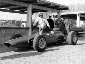 After his accident world famous auto racer John Surtees has stepped into a racing After his accident world famous auto racer John Surtees has stepped into a racing
