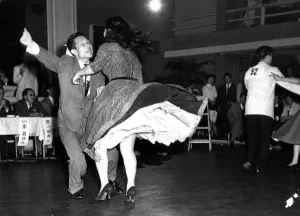 Couple energetically Dancing jive or jitterbug 1950s dance / dancing / party Couple energetically Dancing jive or jitterbug 1950s dance / dancing / party