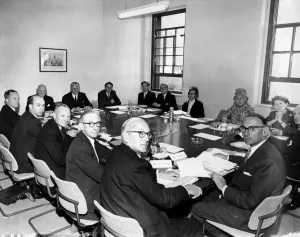 The first meeting of the Milner Holland Committee, which is to inquire into the housing The first meeting of the Milner Holland Committee, which is to inquire into the housing