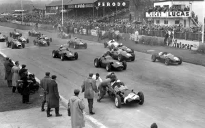 Goodwood England Goodwood International 100 miles event. Stirling Moss in his Goodwood England Goodwood International 100 miles event. Stirling Moss in his