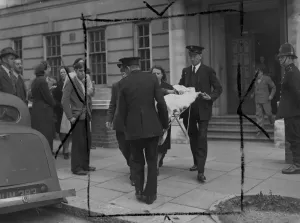 Prints of A baby girl squatter from Duchess of Bedford house, (the block of luxury flats in West Kensington recently taken over by squatters) was taken by ambulance to hospital this morning Ambulance Prints: A Baby Girl Squatter Print