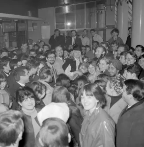 London Airport Arrivals Prints: London : Fans surround folk singers Peter ( with glasses ), Paul and Mary as they