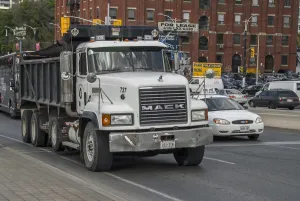 Mack 8 wheeled rigid tipper truck in down town Toronto traffic Mack 8 wheeled rigid tipper truck in down town Toronto traffic