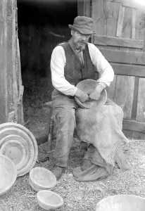 Mr George Lailey engaged in the ancient craft of wooden bowl making at Bucklebury, Berks Mr George Lailey engaged in the ancient craft of wooden bowl making at Bucklebury, Berks