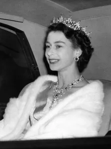 Queen Elizabeth II jewels glittering in her hair and at her throat arrives at Swedish Queen Elizabeth II jewels glittering in her hair and at her throat arrives at Swedish