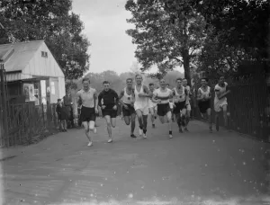 Runners from the Dartford Harriers during a road race. 25 October 1935 Runners from the Dartford Harriers during a road race. 25 October 1935